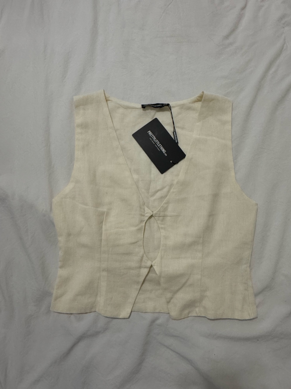 Cream Cut Out Front Top